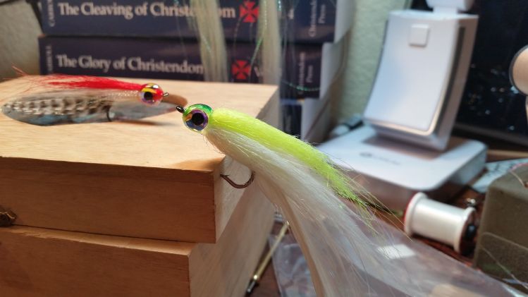 Thanks to all who liked this post!  Tying deceivers and having fun with UV resin.
