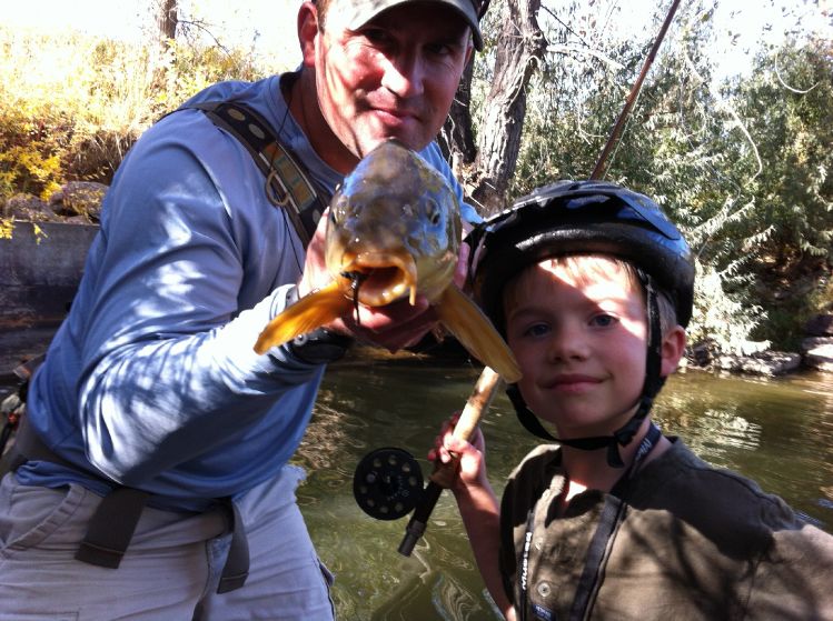 Father and son bonding time. Carp on the fly - denver colorado.