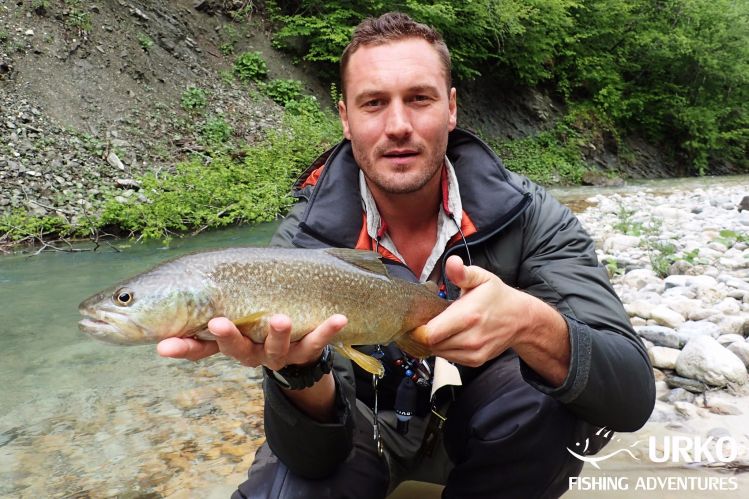 Adam with his beautiful marble trout