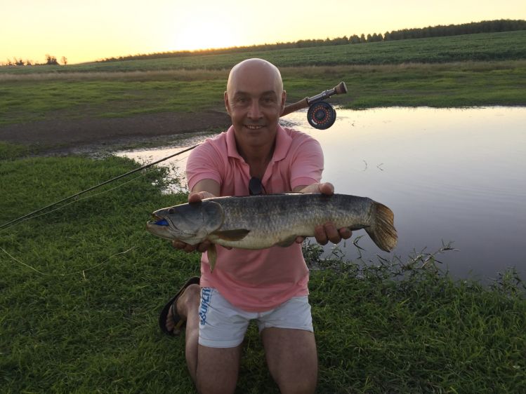 Pesca iniciatica de mi hermano, tajamar escondido con equipo #6 y mosca Titanic 