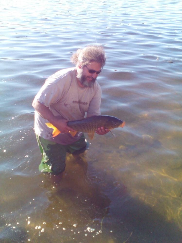 Carpa lago san roque