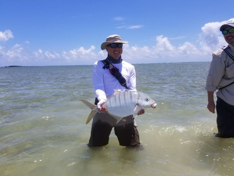 Dennis with his first Golden Trevally
