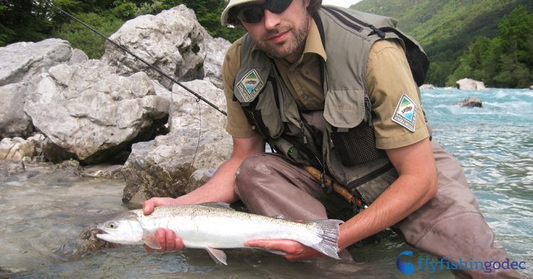 My friend Aleš with his well sized #rainbowtrout 